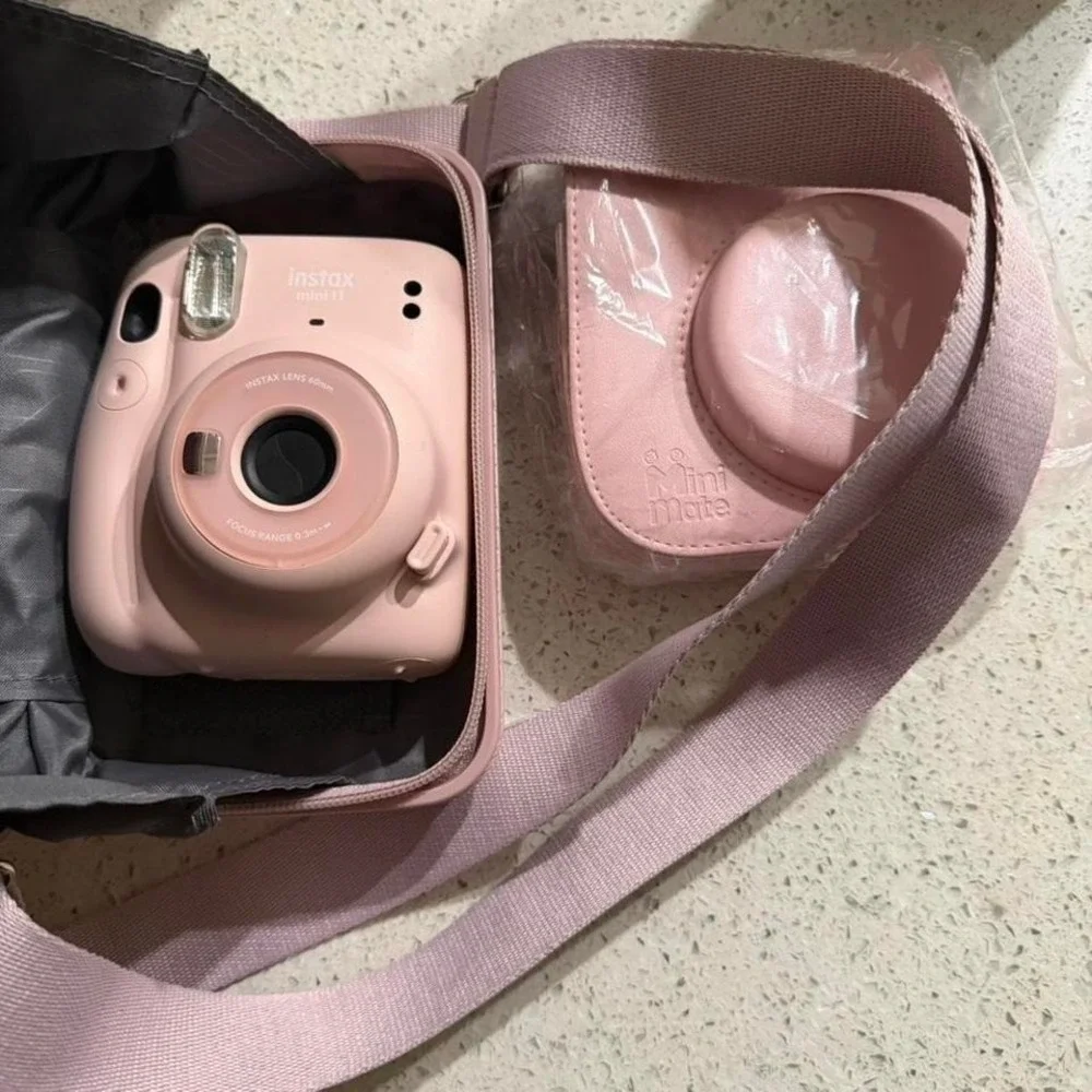 Pink Instax Mini 9 camera with‎ 2 case and strap no battery cover